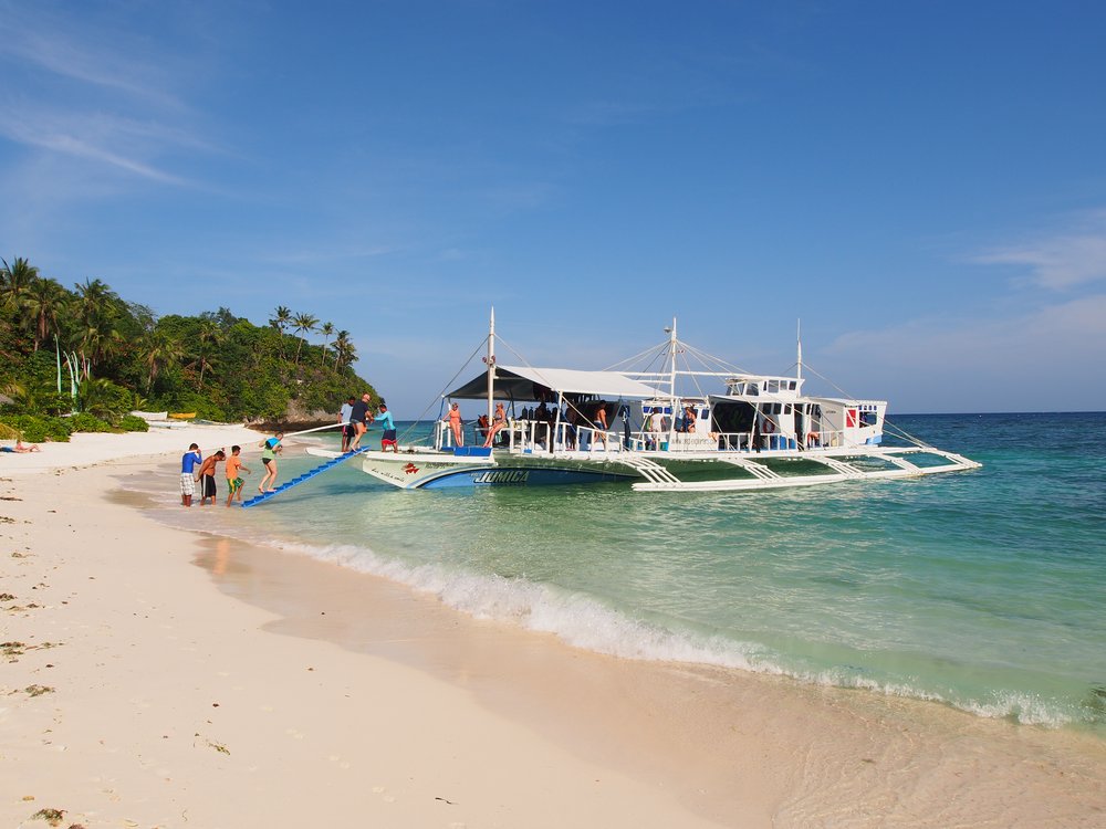 Chris Heim auf einem seiner Auslegerboote, Sea Explorers Philippinen